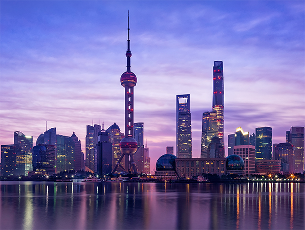 Bylandskapet i Shanghai ved solnedgang.