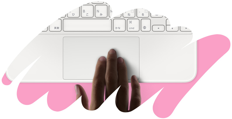 Magic Keyboard Folioのトラックパッドに手で觸れている