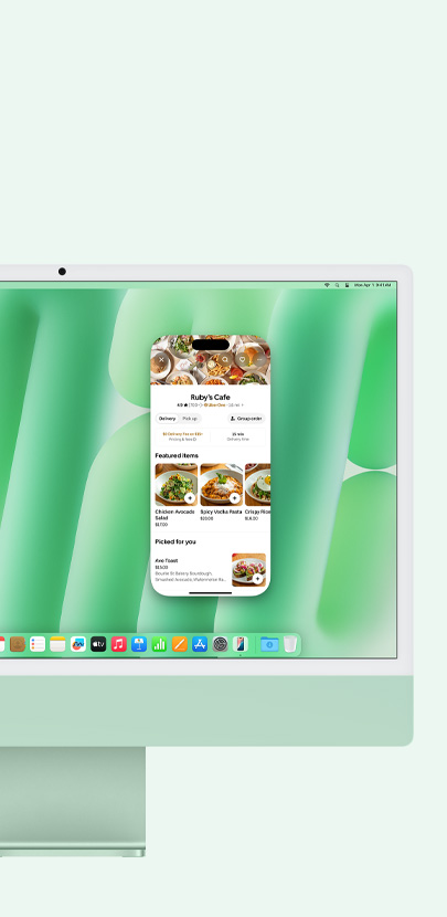 綠色的 iMac，螢?zāi)徽故臼褂?iPhone 鏡像輸出功能和訊息 app。
