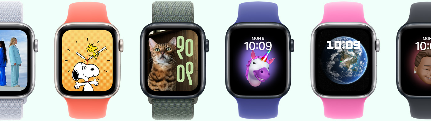 Multiple Apple Watch devices showing various watch face options