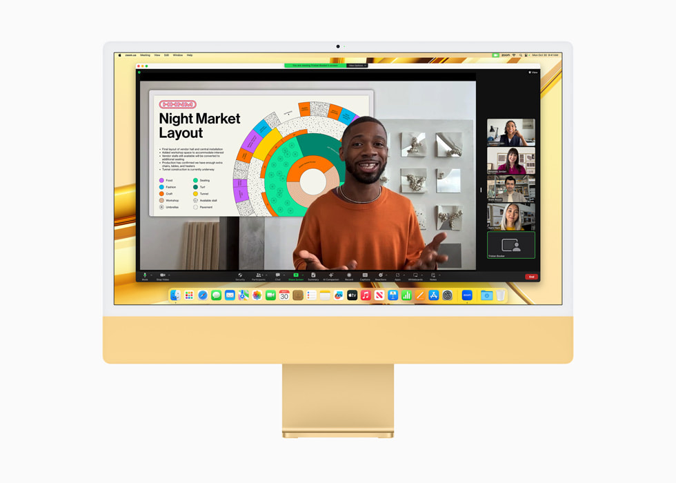 M3 ?ipe sahip sar? renkli yeni iMac’te bir video konferans g?steriliyor.