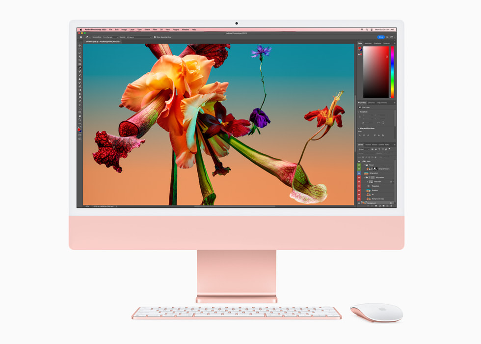M3 ?ipe sahip pembe renkli yeni iMac’te Adobe Photoshop ve iMac ile uyumlu renkte klavye ve fare g?steriliyor.