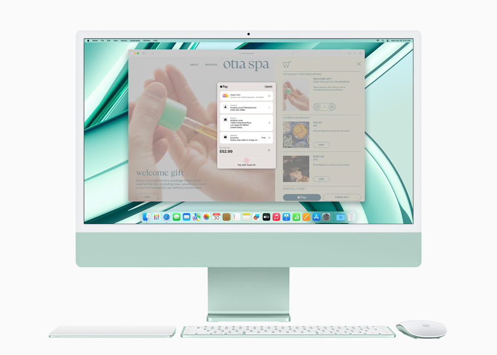 M3 ?ipe sahip ye?il renkli yeni iMac’te Apple Pay ve iMac ile uyumlu renkte trackpad, klavye ve fare g?steriliyor.