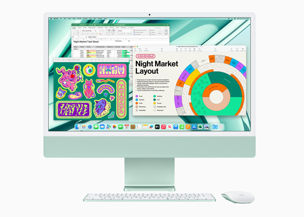M3 ?ipe sahip ye?il renkli yeni iMac’te ?nizleme, Microsoft Excel ve Keynote uygulamalar? ve iMac ile uyumlu renkte klavye ve fare g?steriliyor.