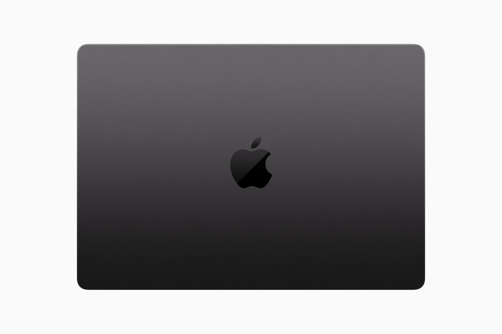 Beyaz bir arka planda yukar?dan g?sterilen kapal? bir MacBook Pro.