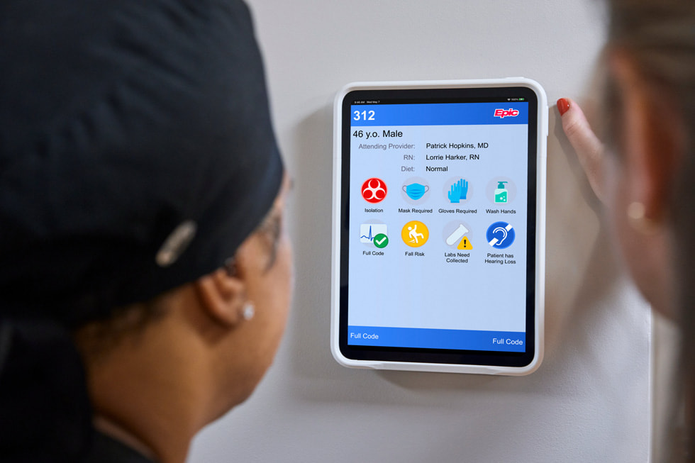 A mounted iPad outside a patient room at Emory Hillandale Hospital.