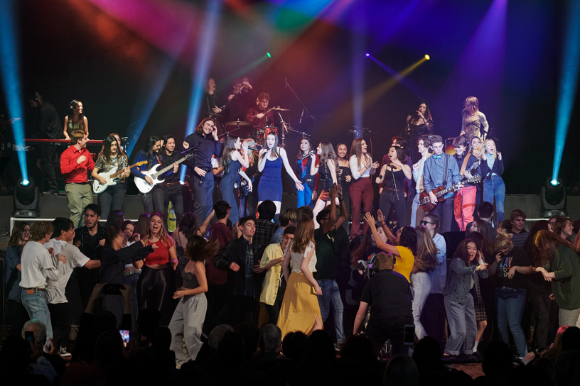 MMET students on stage.