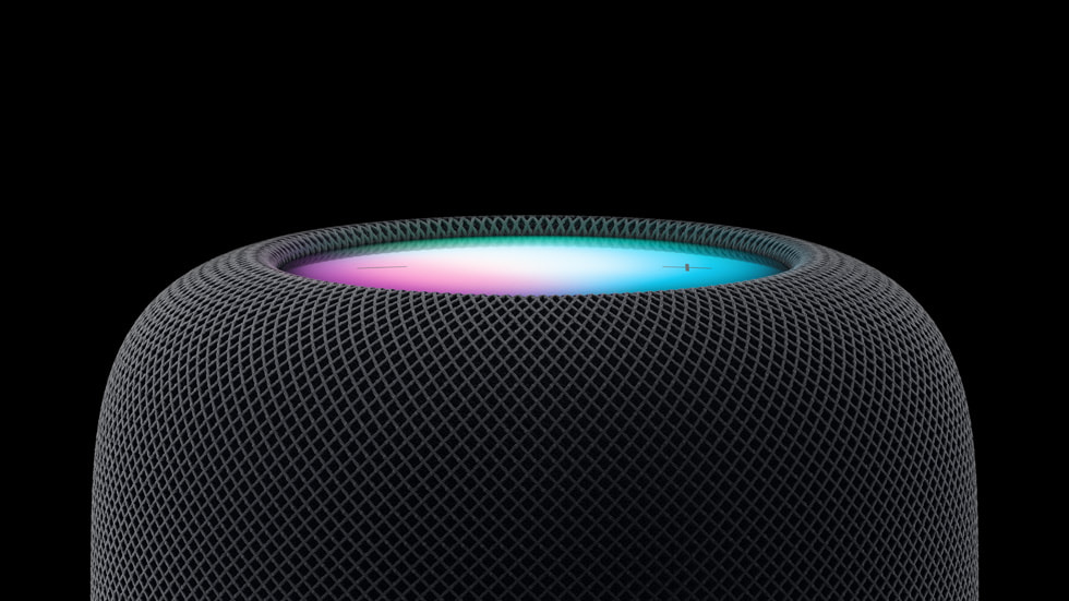 Siyah arka plan üzerinde iki adet HomePod (2. nesil) ayg?t?.