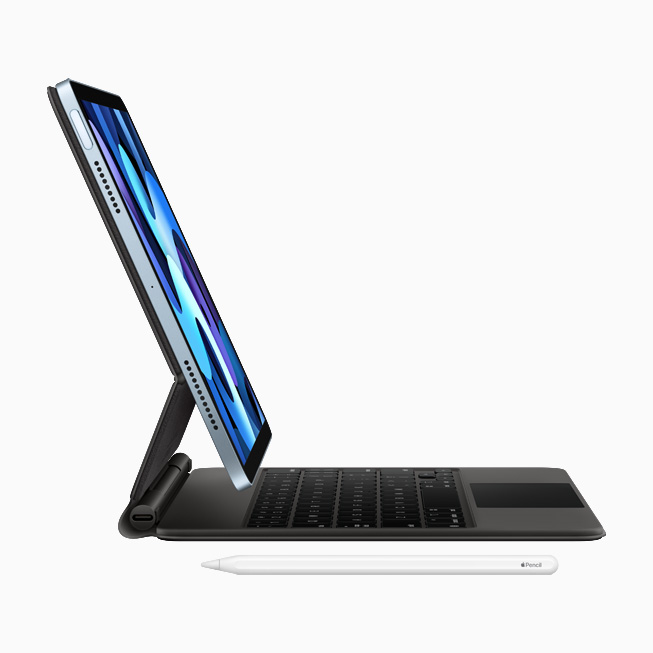 A profile view of iPad Air and Magic Keyboard with built-in trackpad?and Apple Pencil.