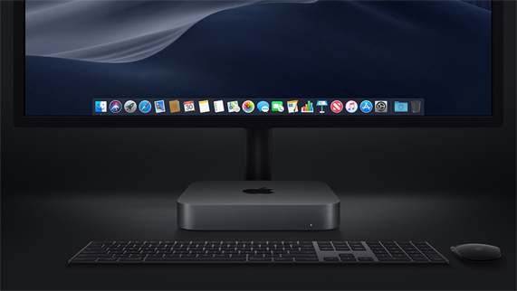 Mac mini’nin Magic Keyboard, Magic Mouse ve ekran ile foto?raf?.