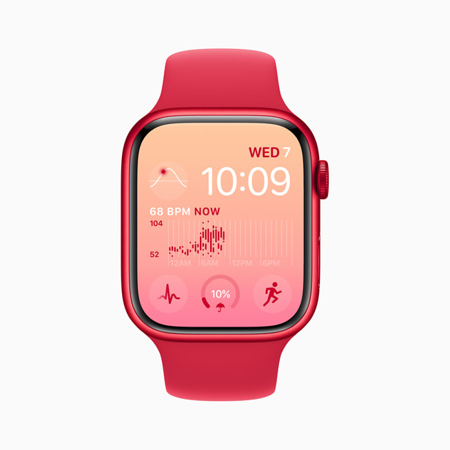 Apple Watch Series 8’de arka plan? pembe ve k?rm?z? olarak düzenlenmi? Modüler saat kadran? g?steriliyor.
