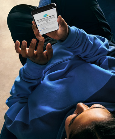 iPhone 15 Pro Max seen from above looking down at it, UI reads Health, Sleep Apnoea