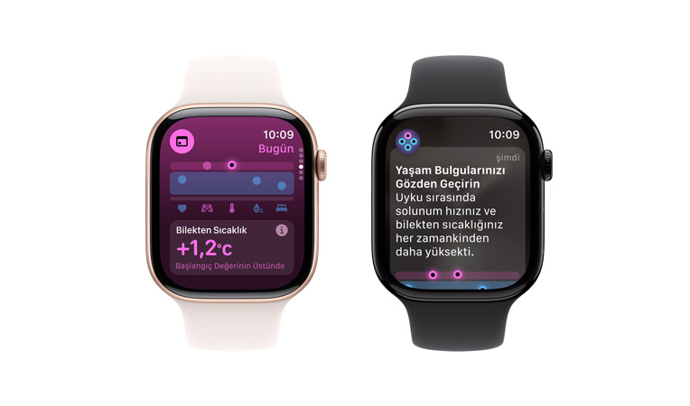 Beyaz Spor kordonlu Apple Watch Series 10’un Kullan?c? Arayüzünde Ya?am Bulgular? Uygulamas?’nda Bilekten S?cakl?k g?rülüyor; yan?nda duran siyah spor kordonlu Apple Watch Series 10’un Kullan?c? Arayüzünde Ya?am Bulgular? Uygulamas?’nda Bilekten S?cakl?k, Kalp At?? H?z? ve Analiz g?rülüyor