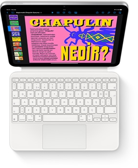 iPad ve beyaz renkte Magic Keyboard Folio’nun tepeden g?rünümü.
