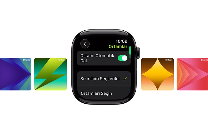 Ortadaki kay??s?z Simsiyah Apple Watch'un kadran?nda “Senin ??in Se?ildi” ve “Medya Se?” se?enekleri, üstte ye?il harflerle Bisiklet (D??) yaz?s?, arka planda ?zel Apple Music duvar ka??tlar? yer al?yor