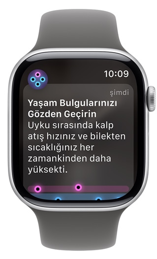 Apple Watch ekran?nda bir uyar? g?rünüyor: "Ya?am Bulgular?n?z? G?zden Ge?irin"