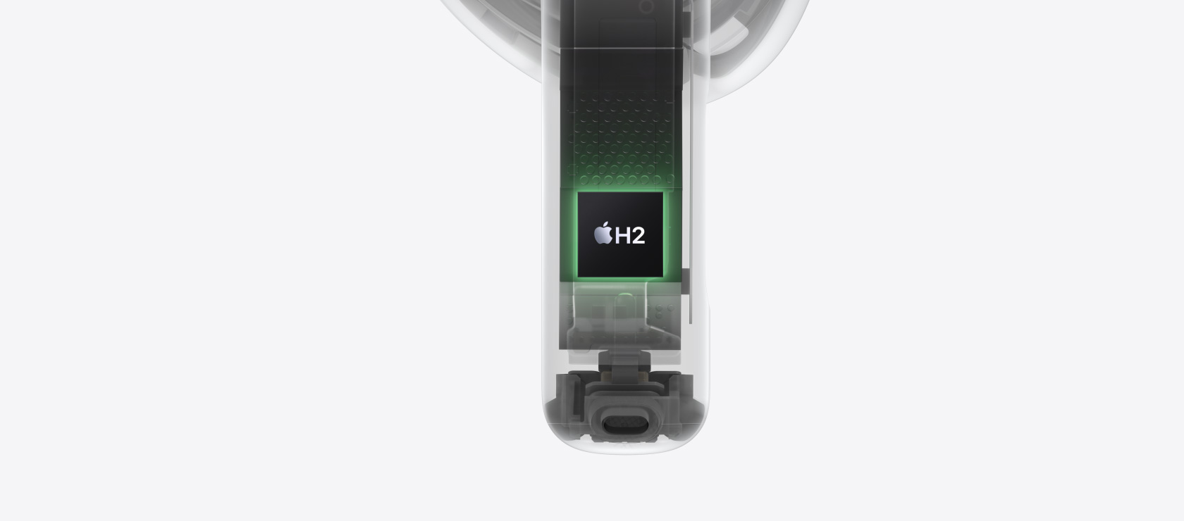 H2-chippet visas inuti skaftet p? en AirPods 4-sn?cka.