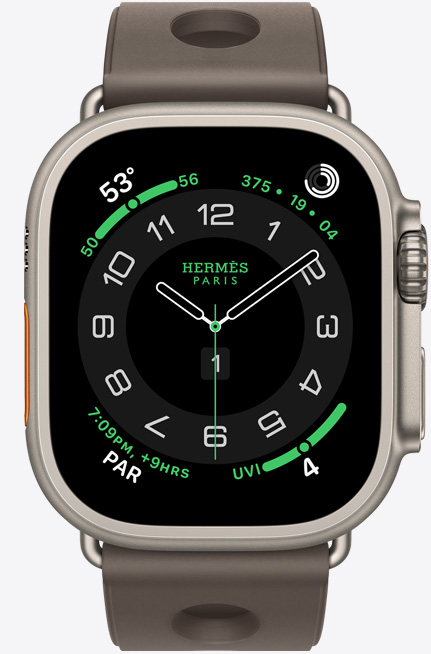 Apple Watch Hermès Ultra 3, Titangeh?use, Farbe Natur, Hermès Circulaire Zifferblatt, Komplikationen: Wetter, Aktivit?tsringe, PAR, UV Index, Geh?use rechts, Digital Crown, Mikrofon, erh?hte Seitentaste, Scub’H Diving Armband, Farbe Gris Titane