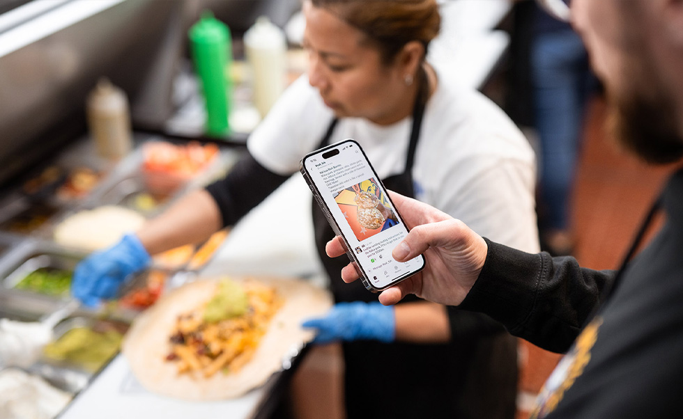Slack on iPhone helps Se?or Sisig’s workforce seamlessly communicate across locations.