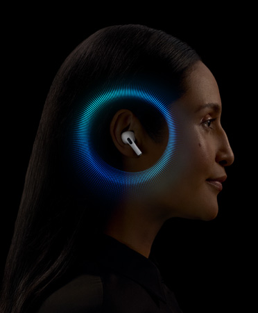 A person wearing AirPods Pro 2 with sound waves animating around the ear