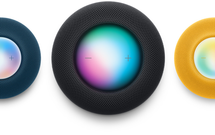 ブルーのHomePod mini、ミッドナイトのHomePod、イエローのHomePod miniを上から見た畫像。Siriがオンになっている
