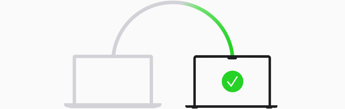 Ilustrasi sederhana yang menunjukkan transfer data dari laptop lama ke laptop baru.