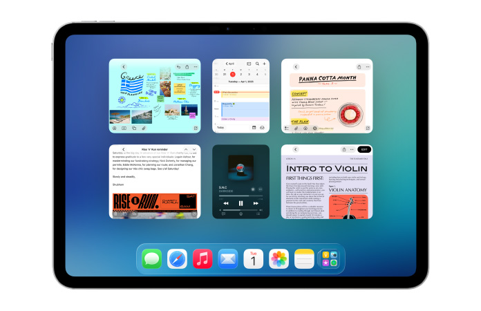 iPad, landscape orientation, screen shows multiple apps like Calendar and Music app in six windows lined up in two rows to show windows equally
