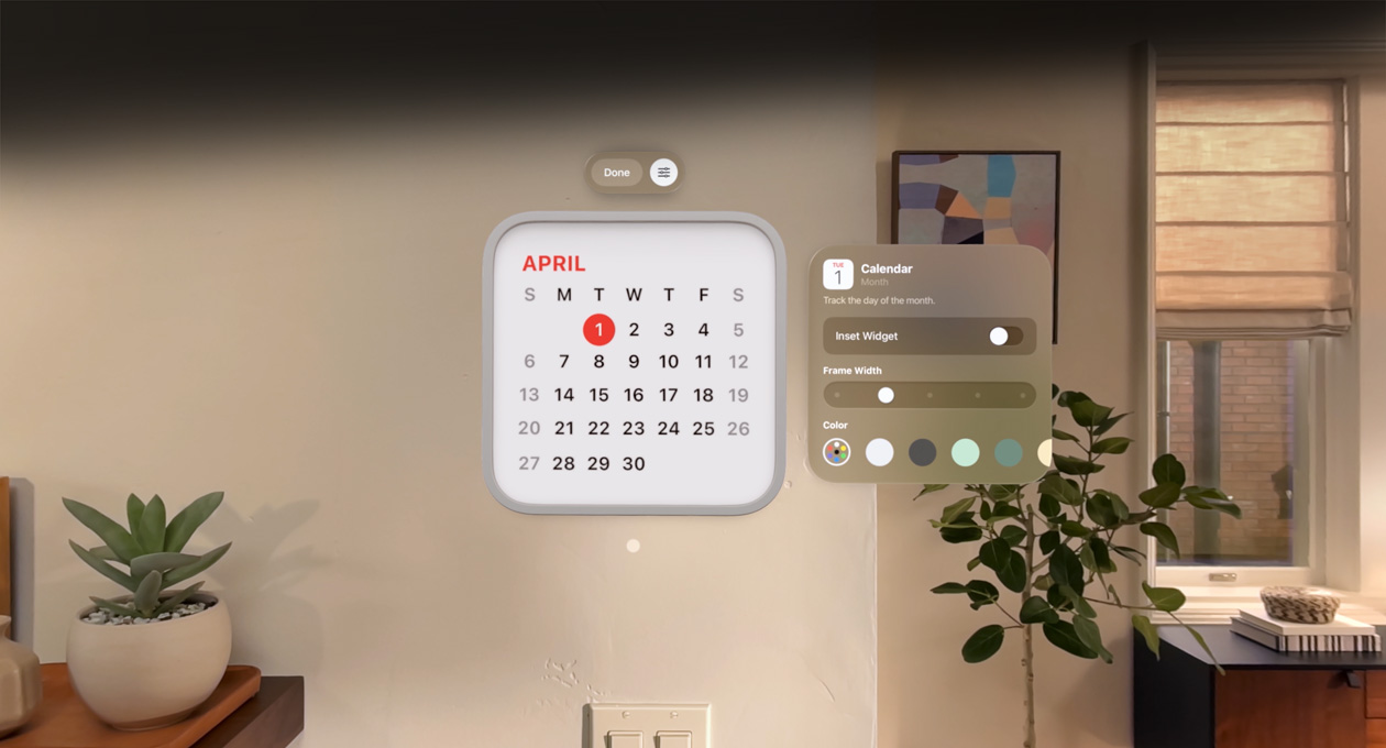 Ein Kalender Widget für den 1. April schwebt an der Wand, das Widget für Erinnerungen befindet sich darüber, auf der rechten Seite sind Optionen zur Personalisierung für die ?nderung der Rahmendicke und -farbe zu sehen